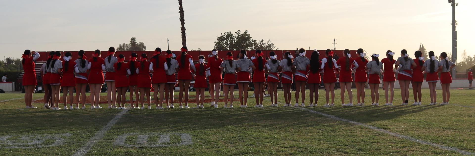 Combined cheer performing at halftime of the football game
