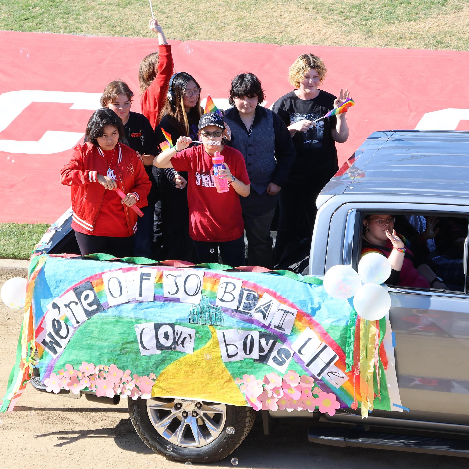 students and staff at the homecoming rally
