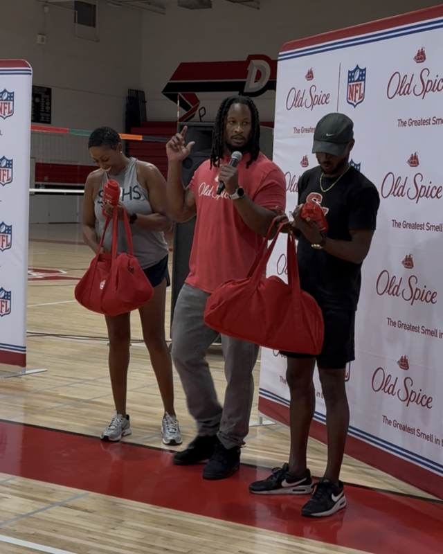 NFL Pro Todd Gurley gifts Varsity coaches Old Spice merch.