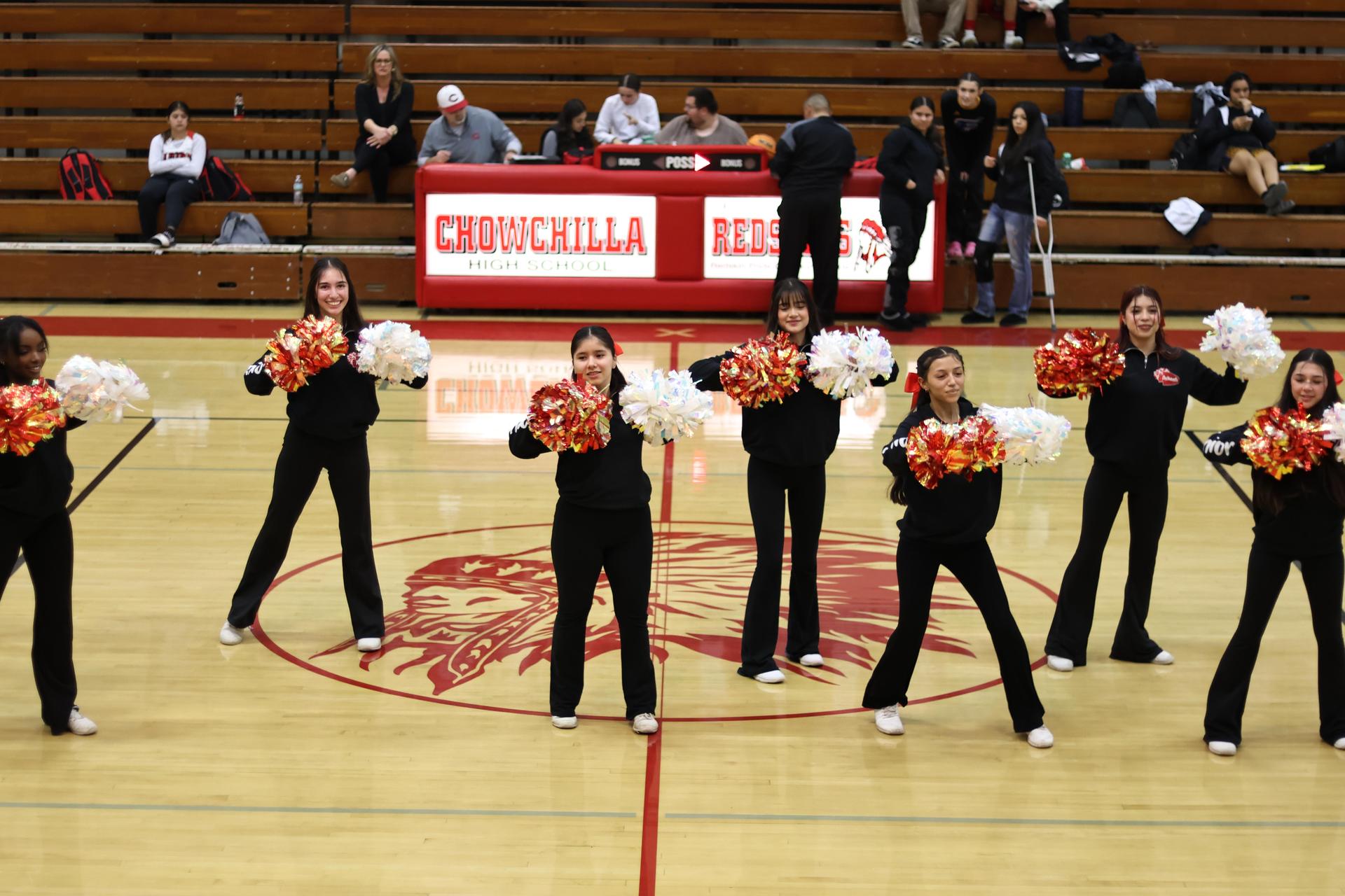 varsity cheerleaders in action