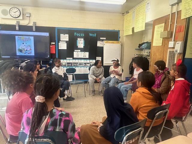 5th graders sharing out the oral tradition of reading together