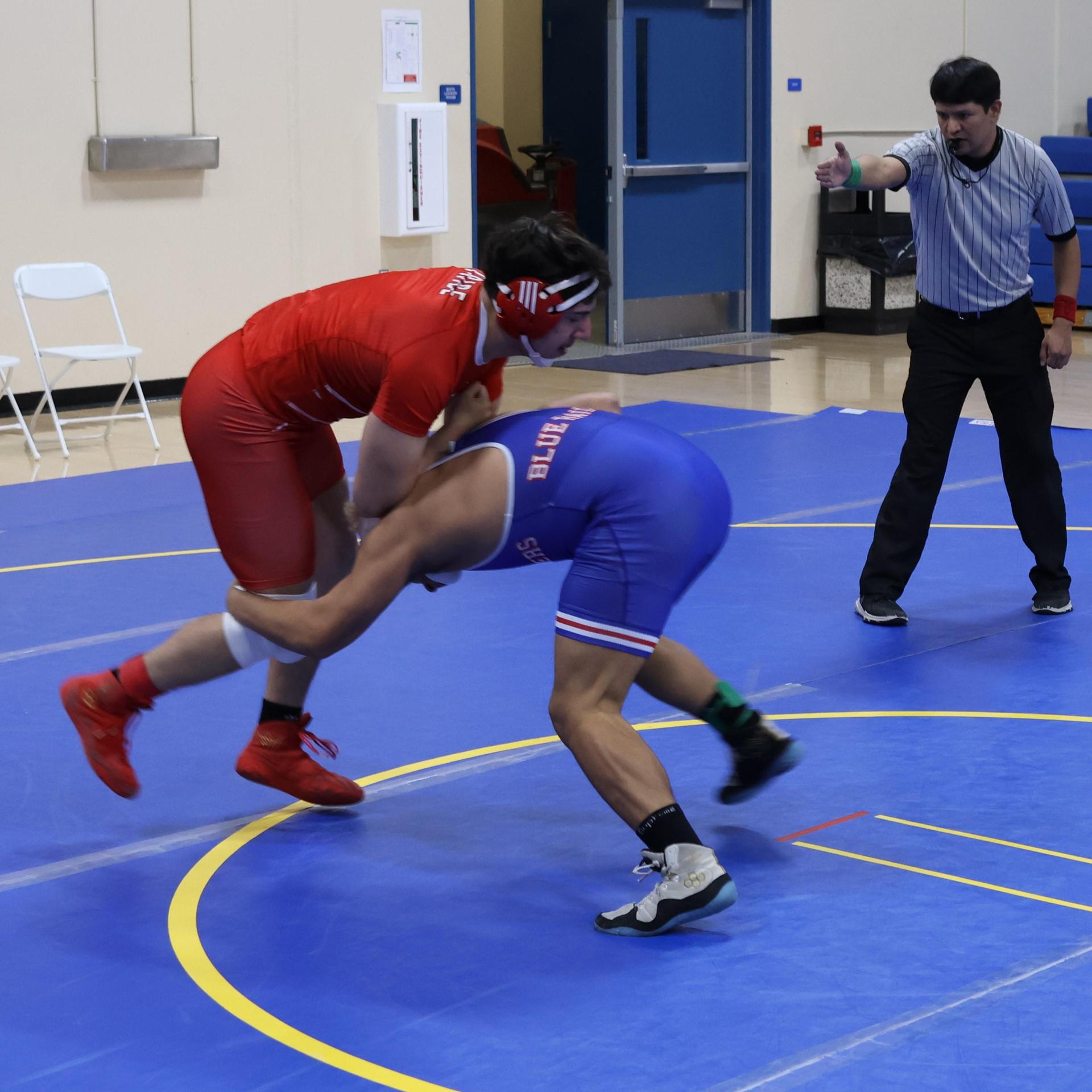 wrestlers in action at parlier