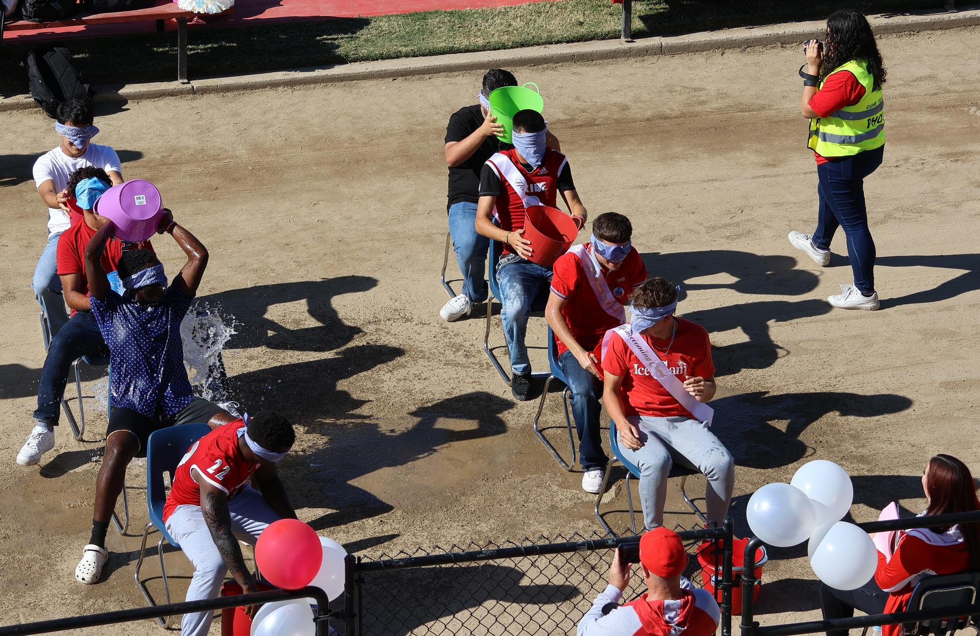 students and staff at the homecoming rally