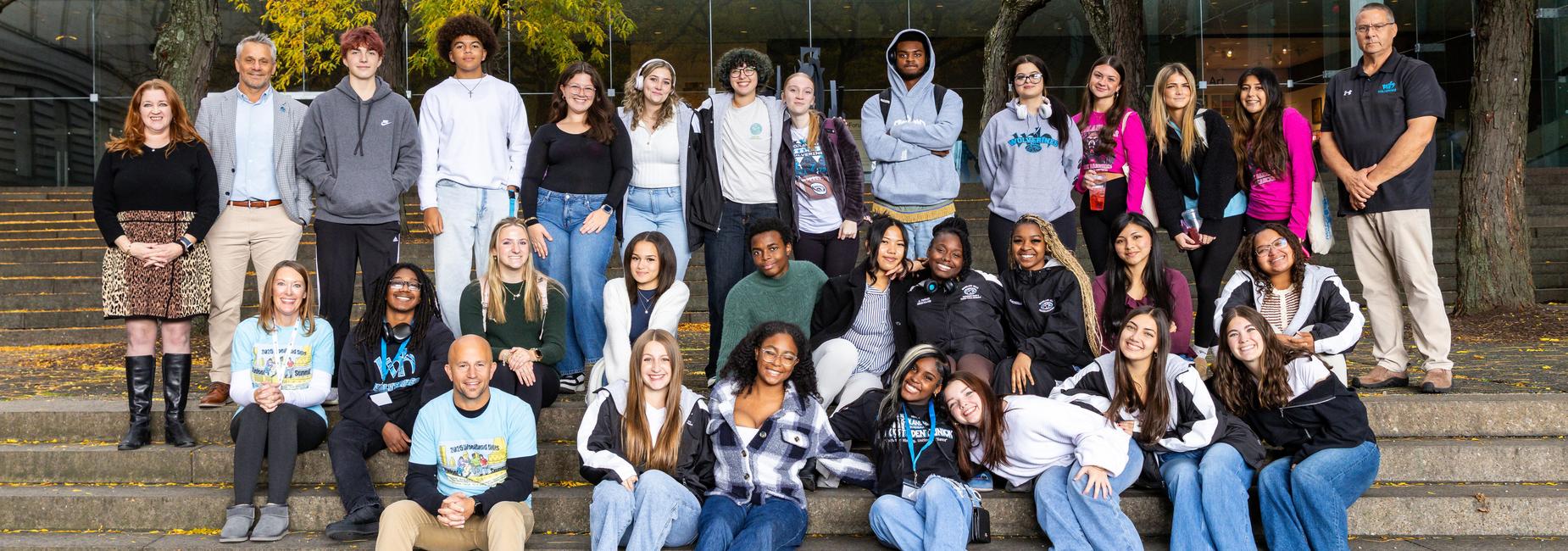 Student Summit leaders and teachers pose outside of Carnegie Museum