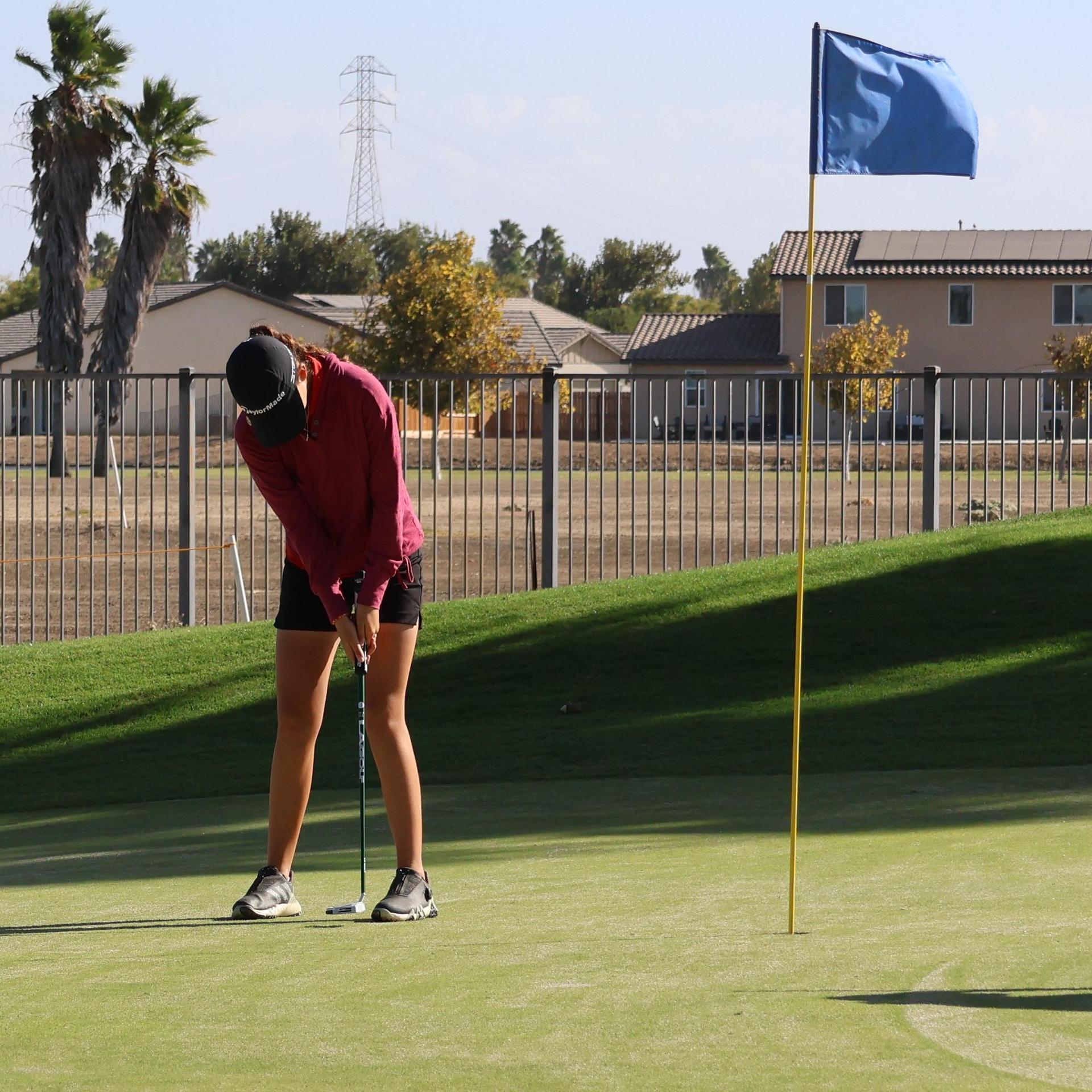 Girls golfers in action at the championships