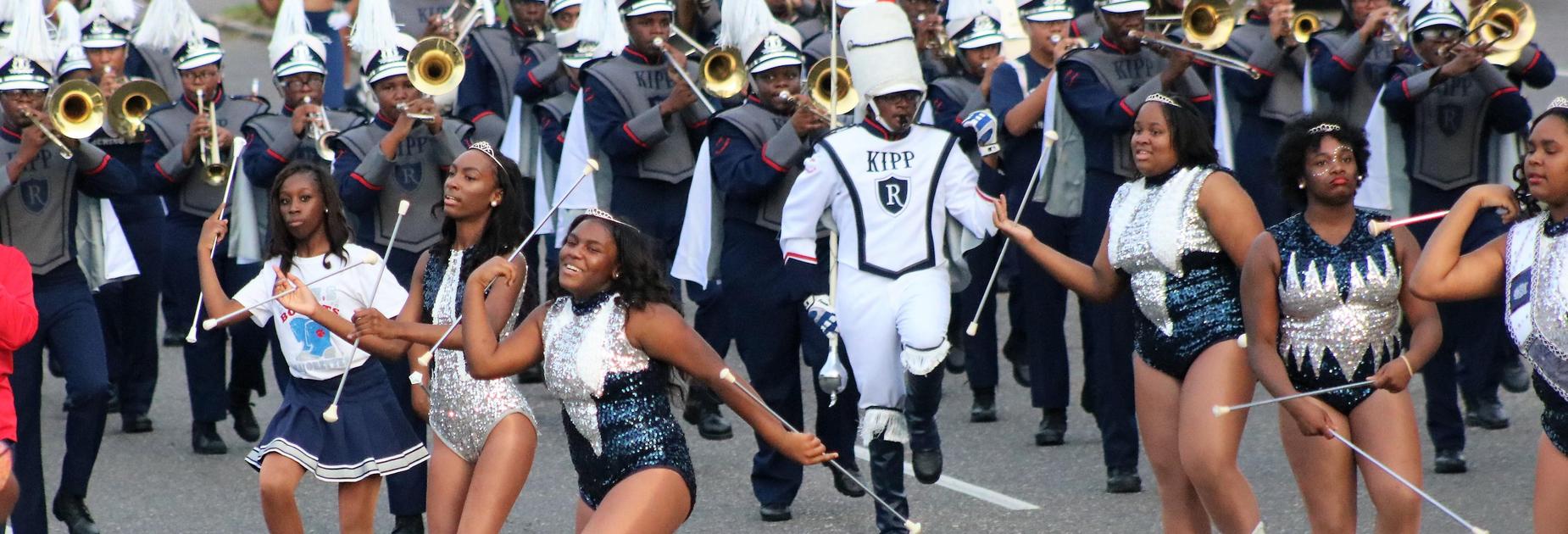 KRHS majorettes followed by the drum leader in the homecoming parade