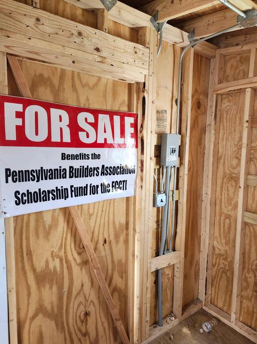A shed built by the Building Construction students that is for sale.
