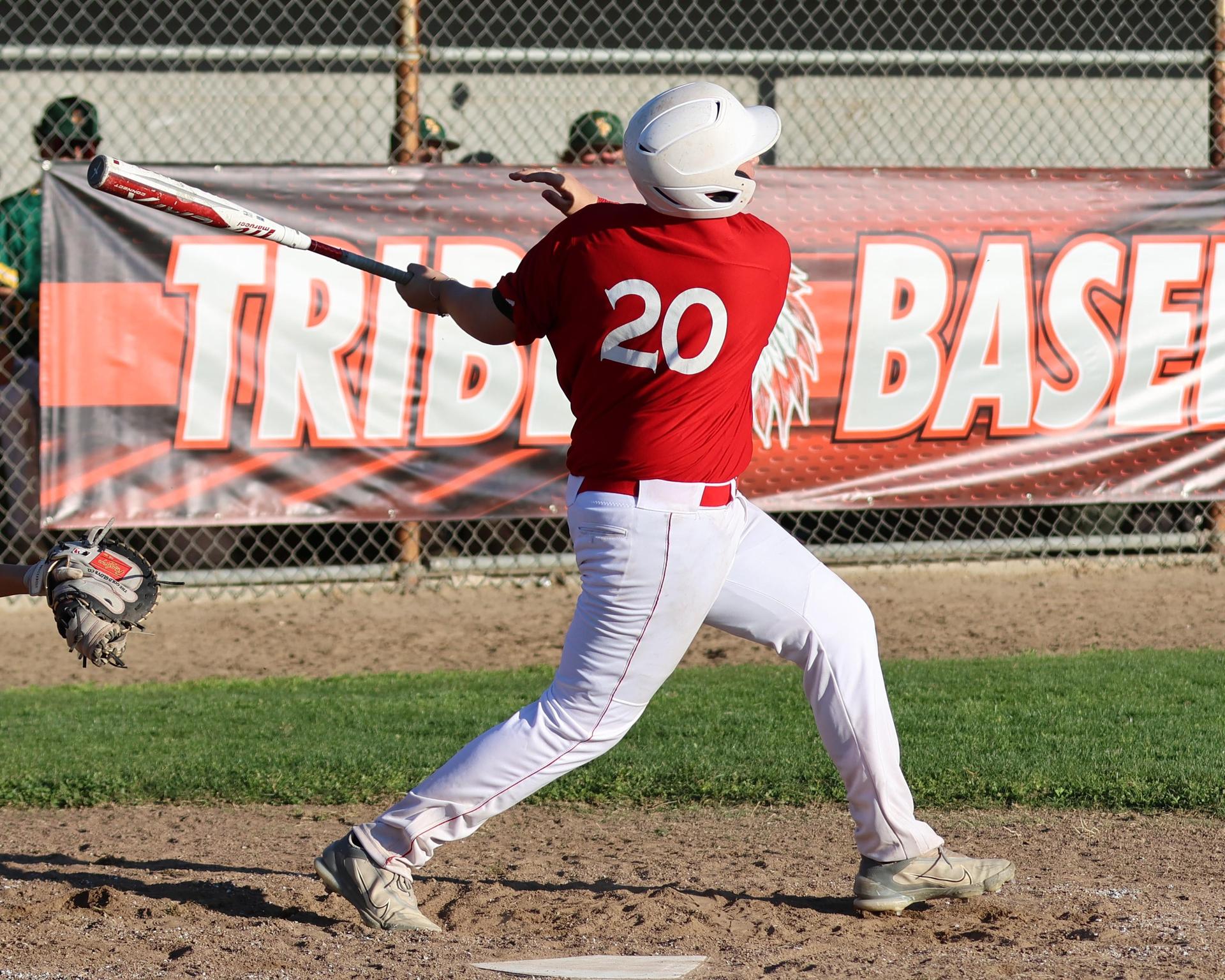 junior varsity baseball players in action
