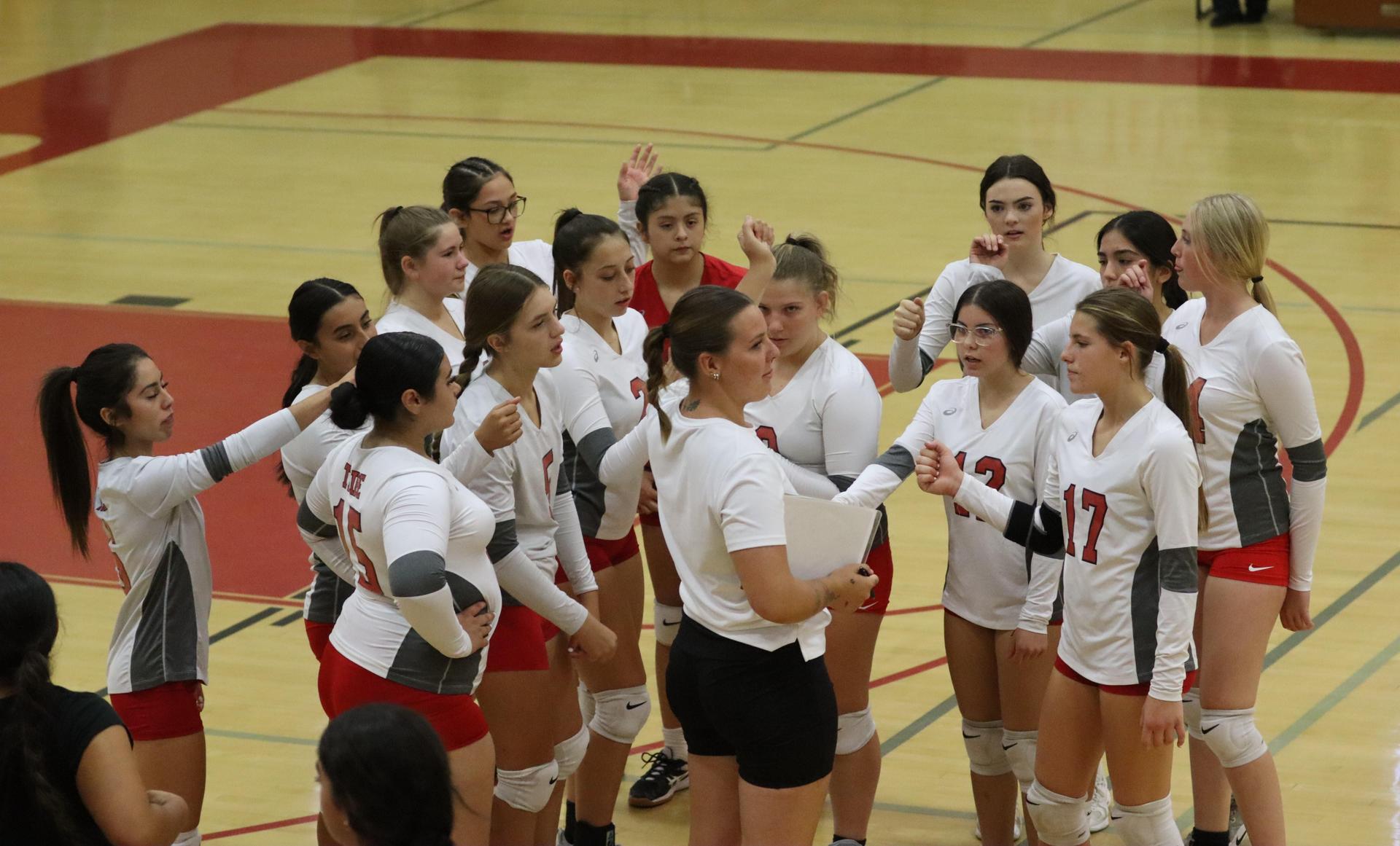 junior varsity girls playing volleyball against Mendota