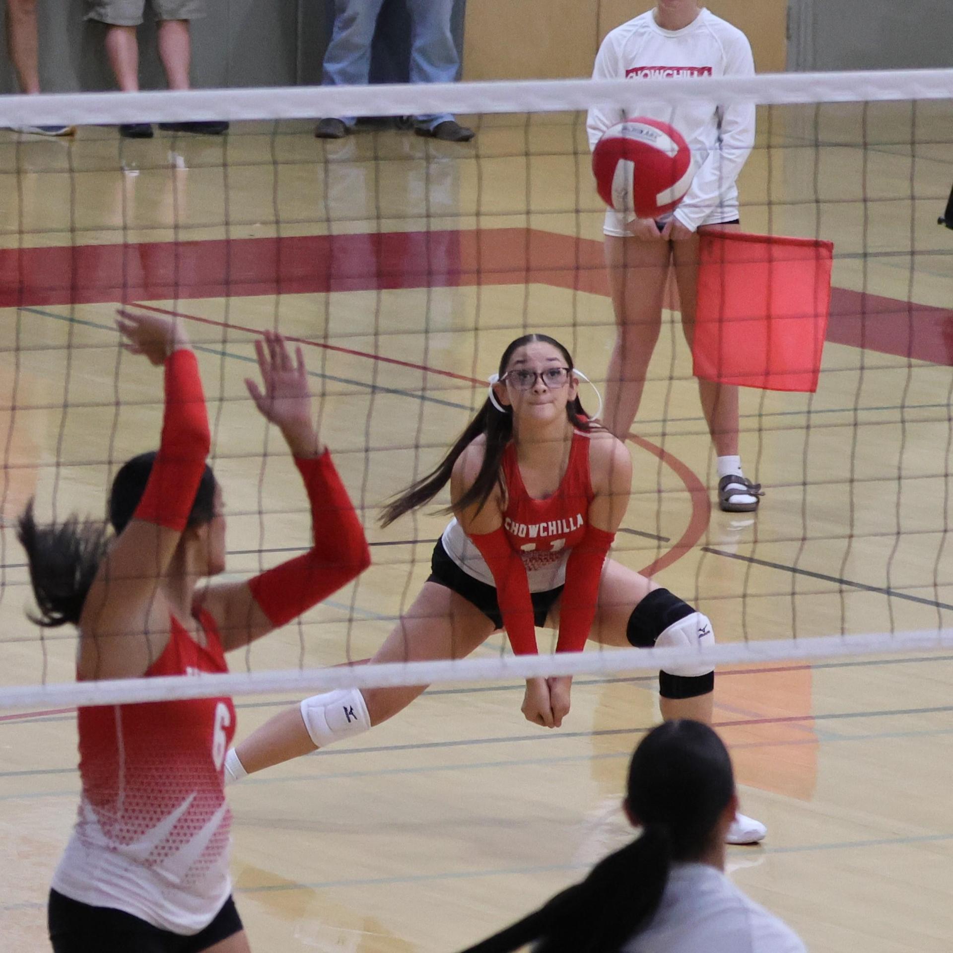 Varsity girls Volleyball playing vs. Madera 26
