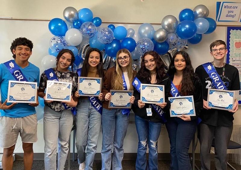 Five Brewer High School seniors in the Education in Training program earned their educational aide certifications and two will complete it this summer. Pictured l-r are: Louis Castoreno, Aileth Coronado, Brianna Rodriguez, Kaylie Hoverman, Arizandy Coronado, Isabella Godinez and Ethan North. Their teacher is Maggie Howard.