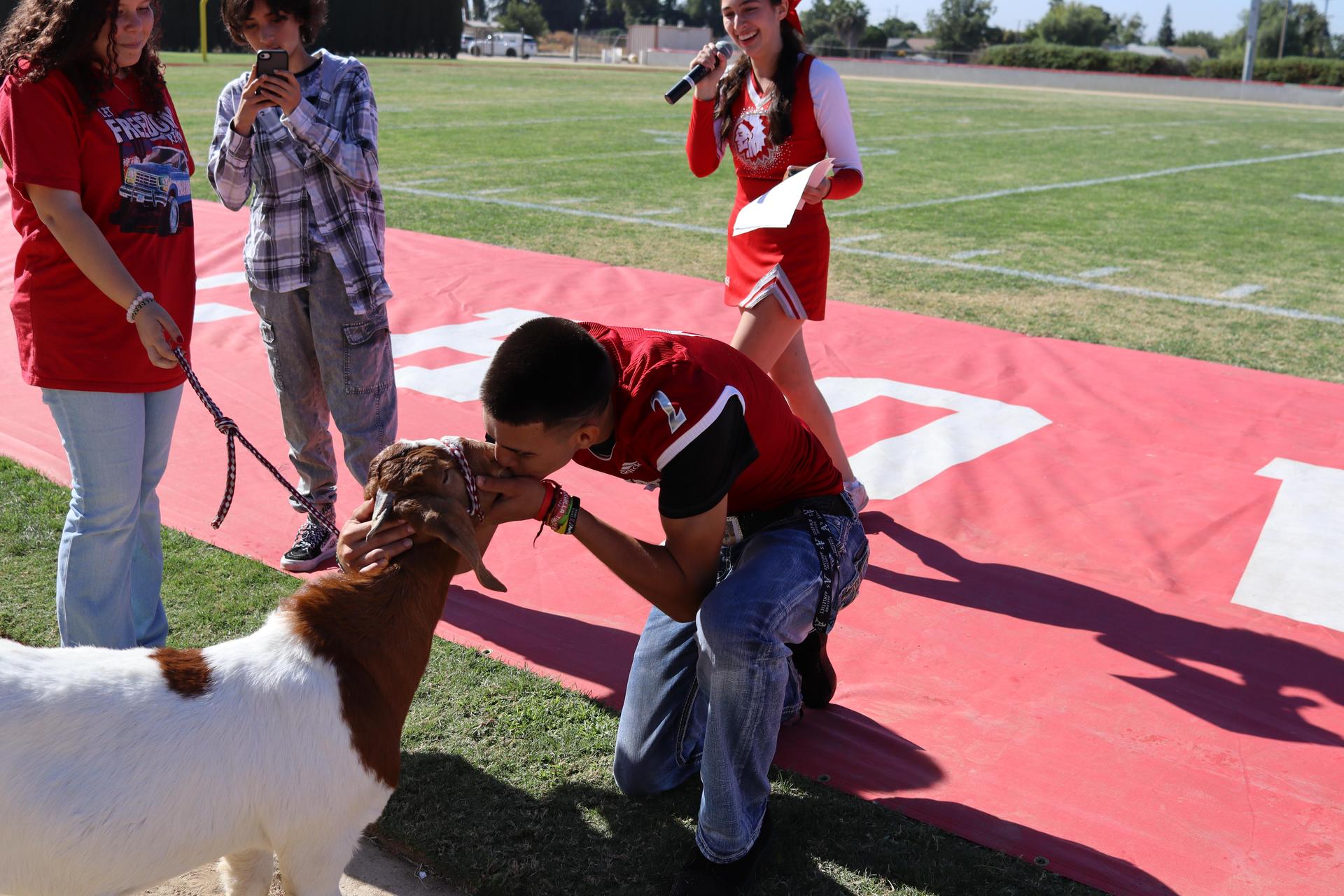 students and staff at the homecoming rally