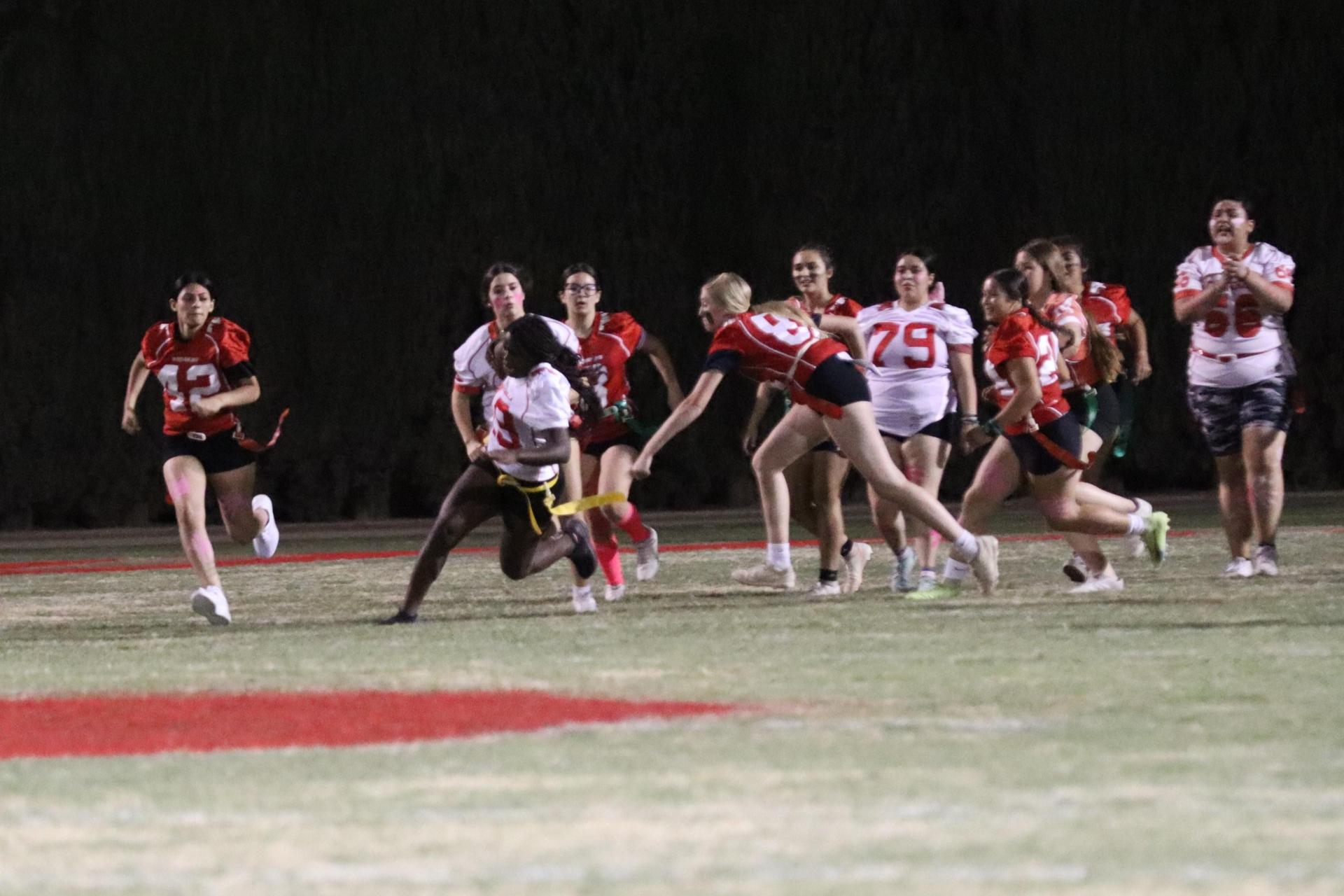 girls playing flag football