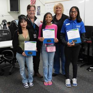 Three student winners with teacher and EMWD representative