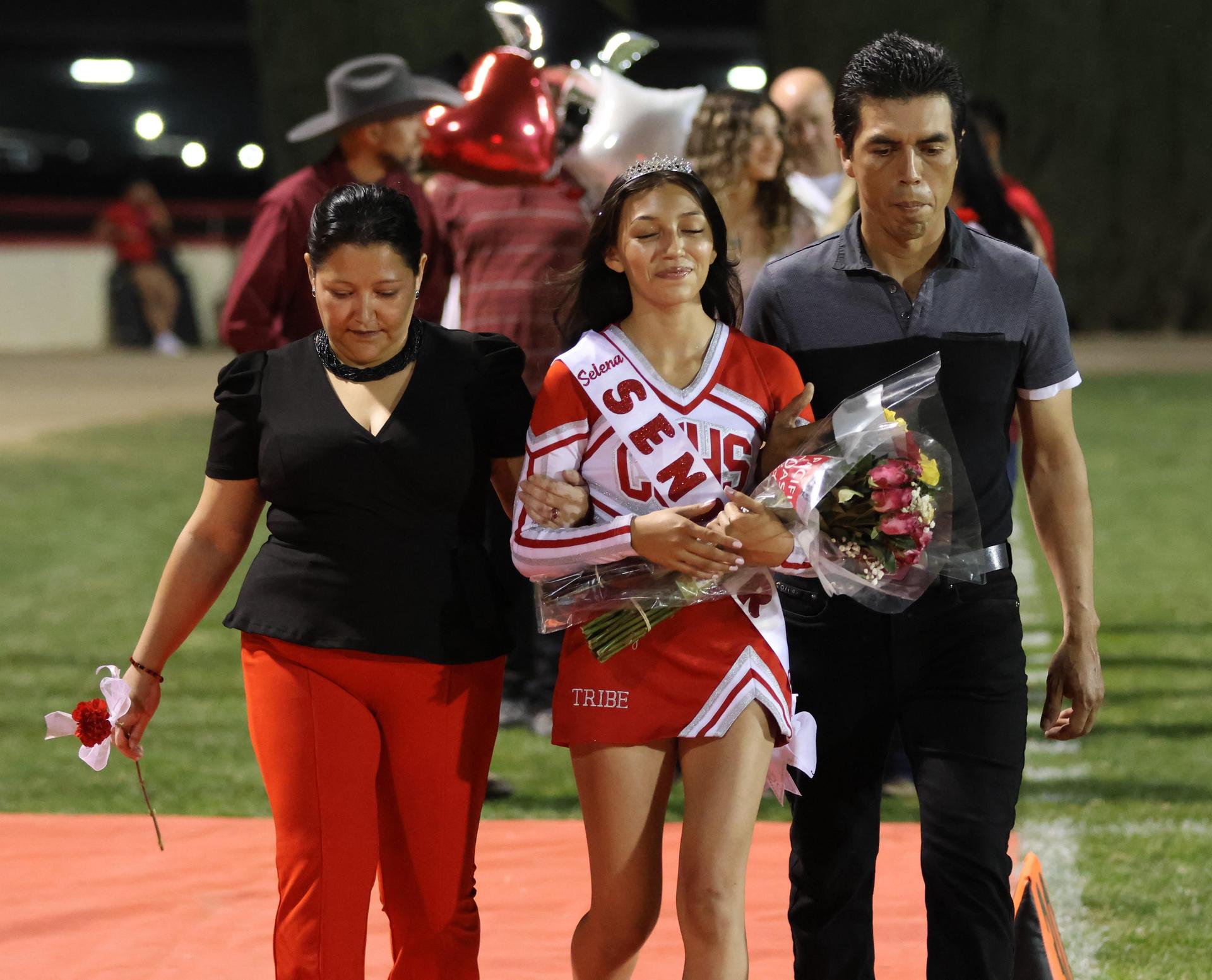 seniors and their escorts celebrating senior night