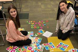 Seniors Rachel Ambrose and Delaney Price work on a SADD Club project
