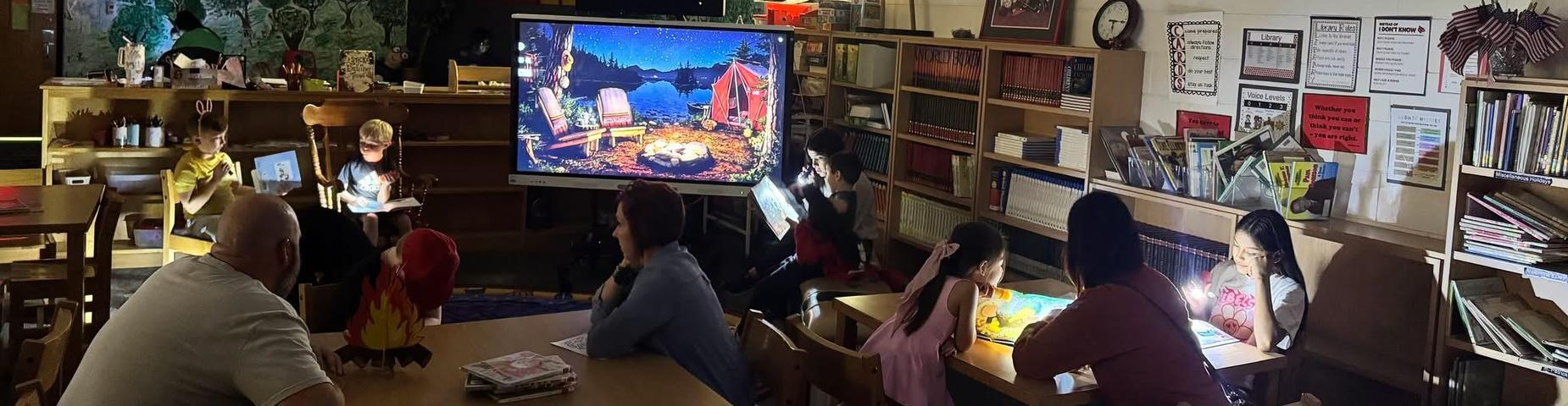 Picture of families reading together.