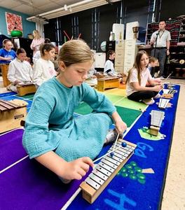 Student playing instrument