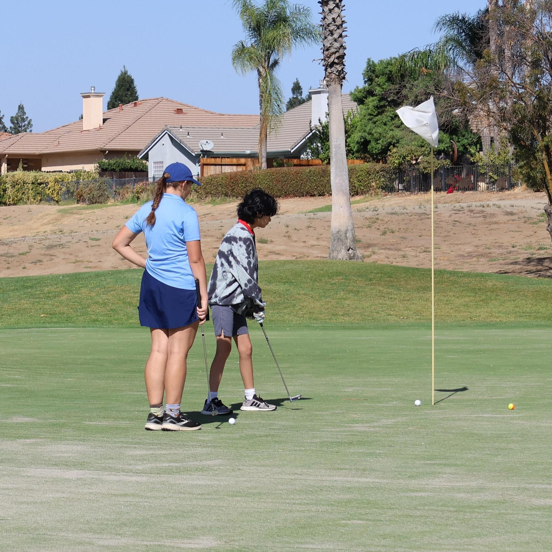 Girls golfers in action at the championships