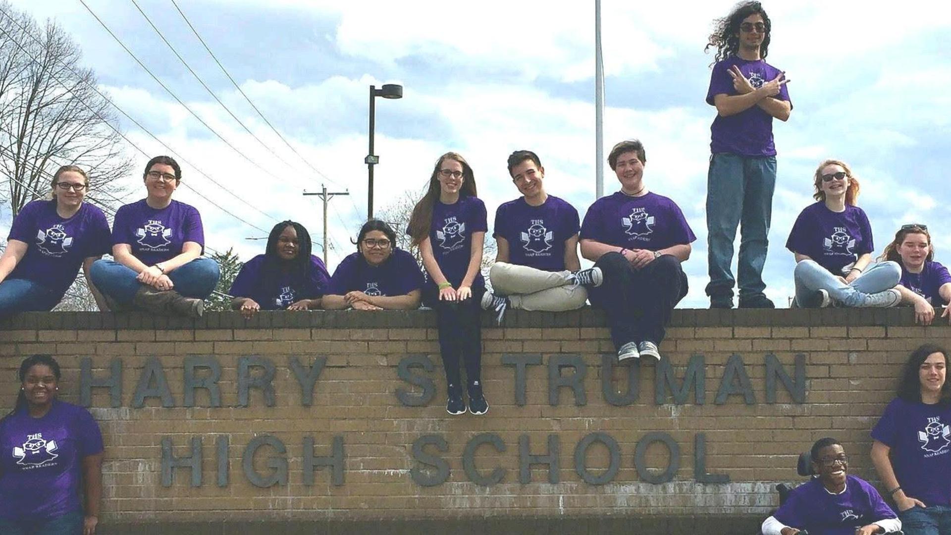 Students at Truman Sign