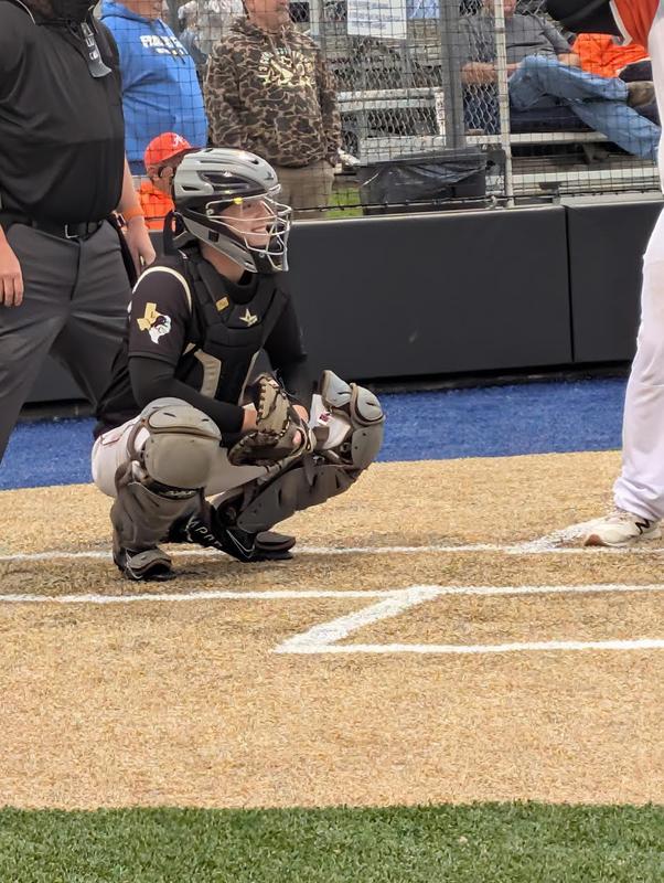 Vaden playing catcher.