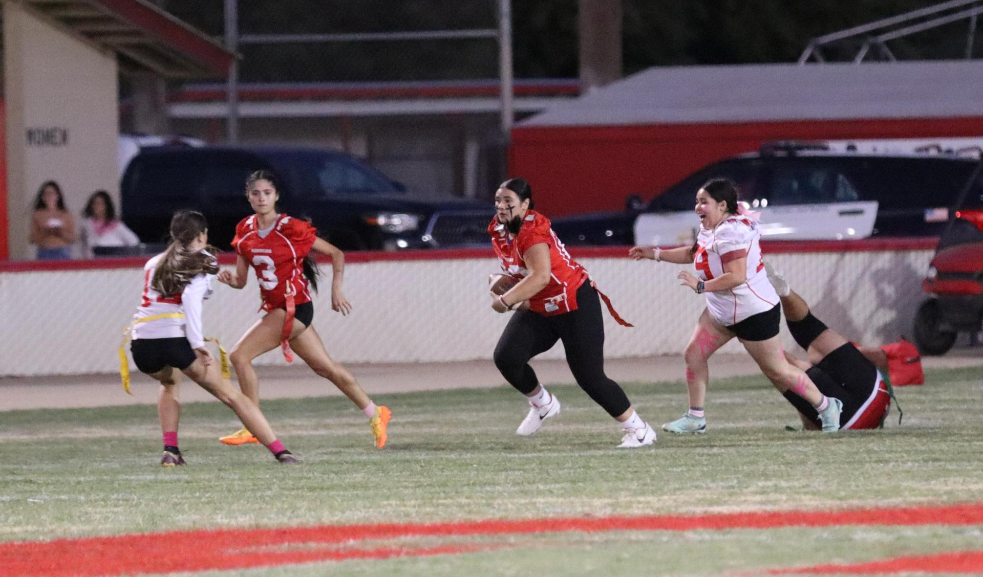 girls playing flag football