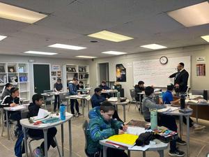 Rabbi Gruen's class learning Gemarah