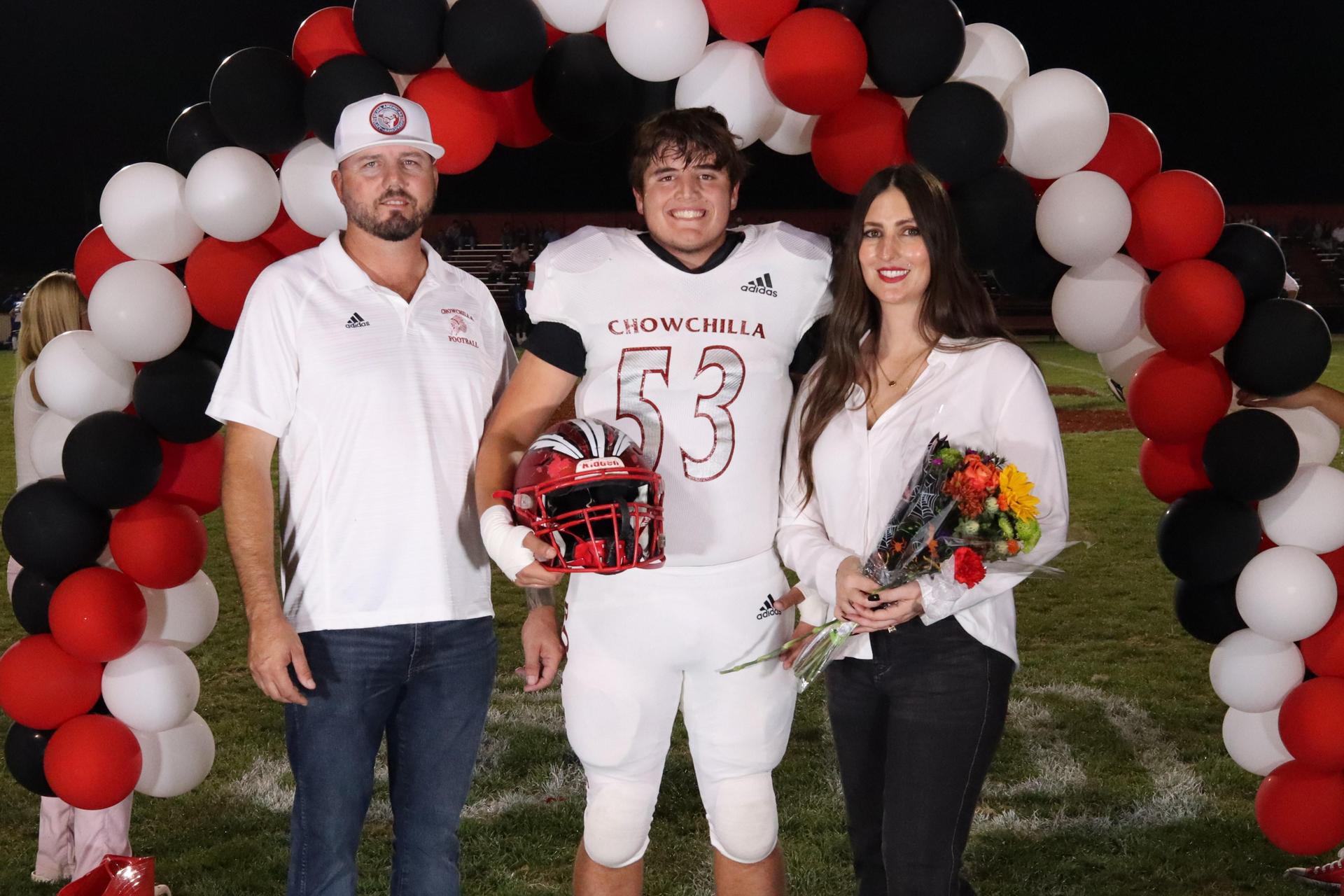 seniors and their escorts celebrating senior night