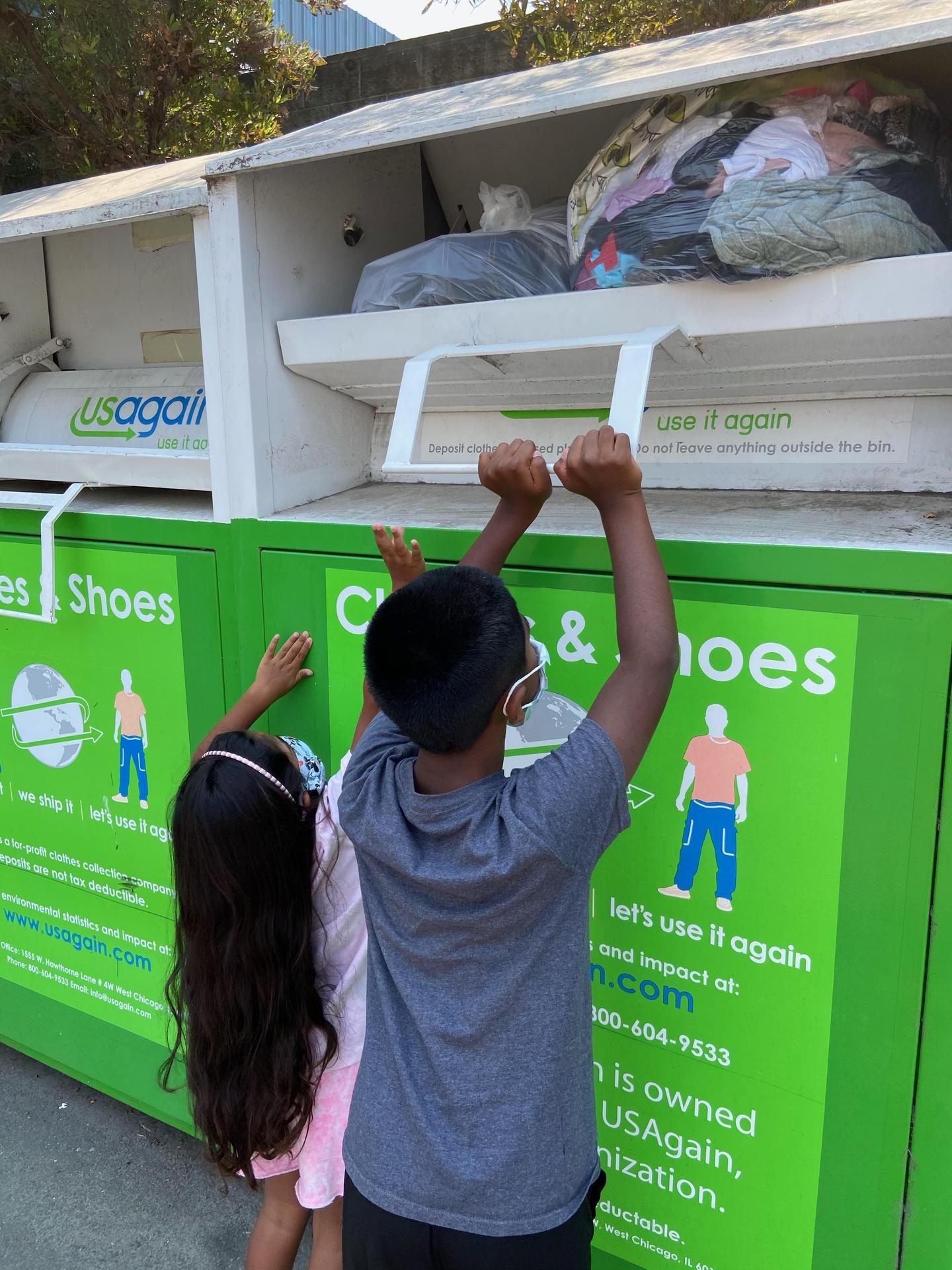 Two students participating in student outreach