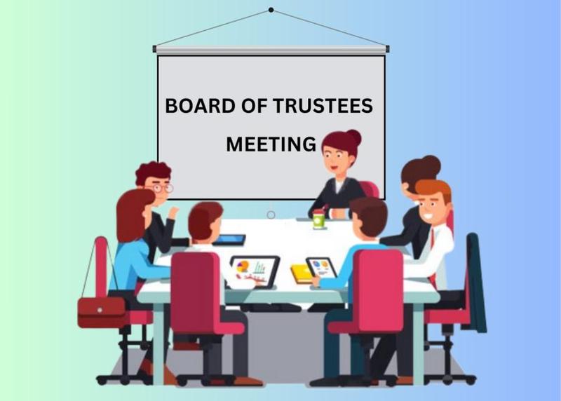People sitting around a table for board meeting