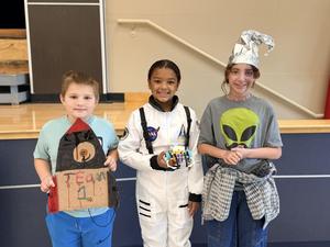 Legacy GEAR Team dressed in alien and space costumes for competition