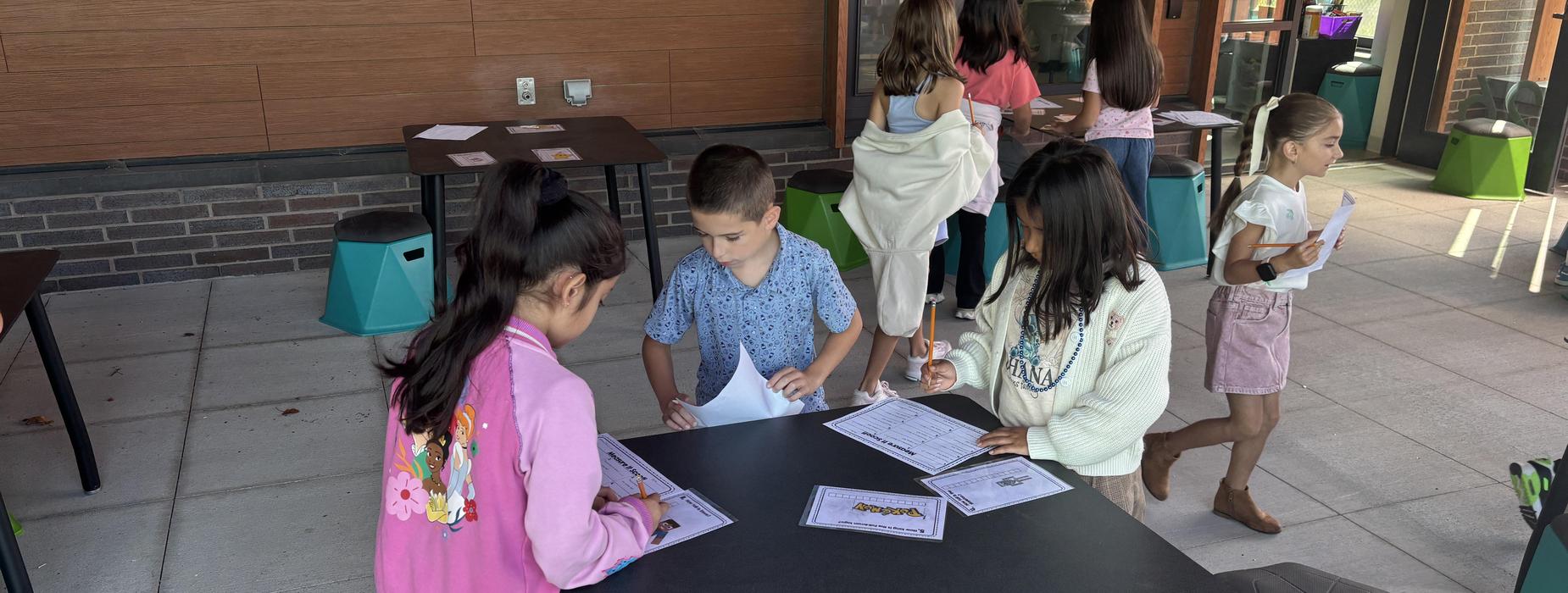 Students working in an outside classroom at Garden City School