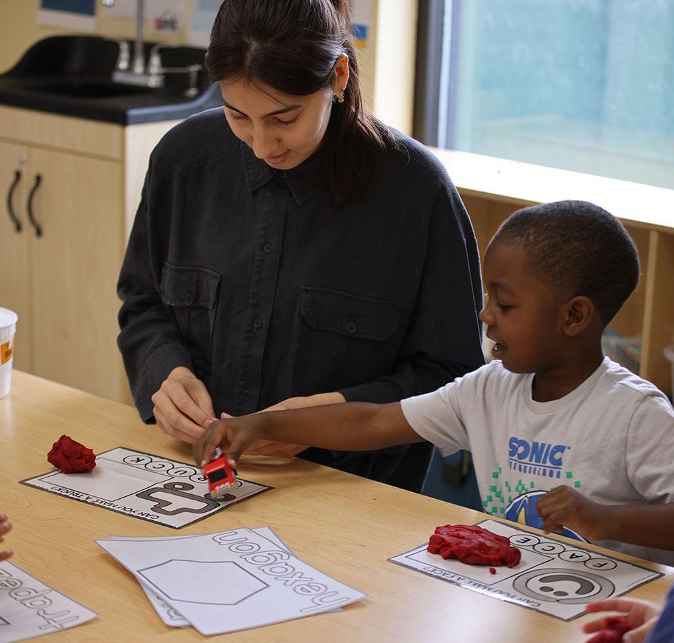 MMSA teacher and student working on a project together