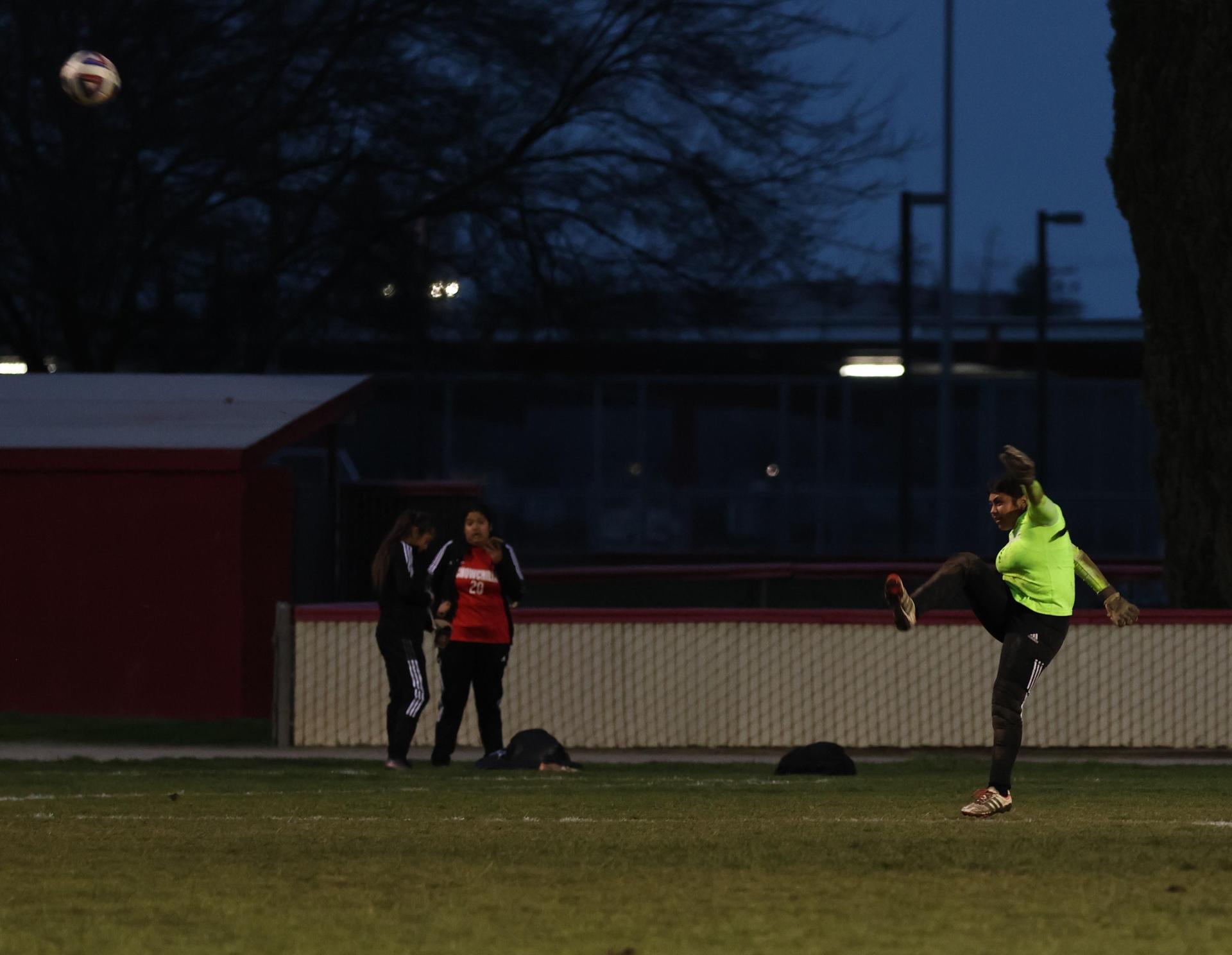 Junior varsity girls playing soccer against liberty