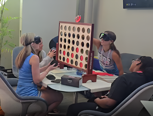 students used impairment simulation googles during a breakdown session at the Fall Youth Summit