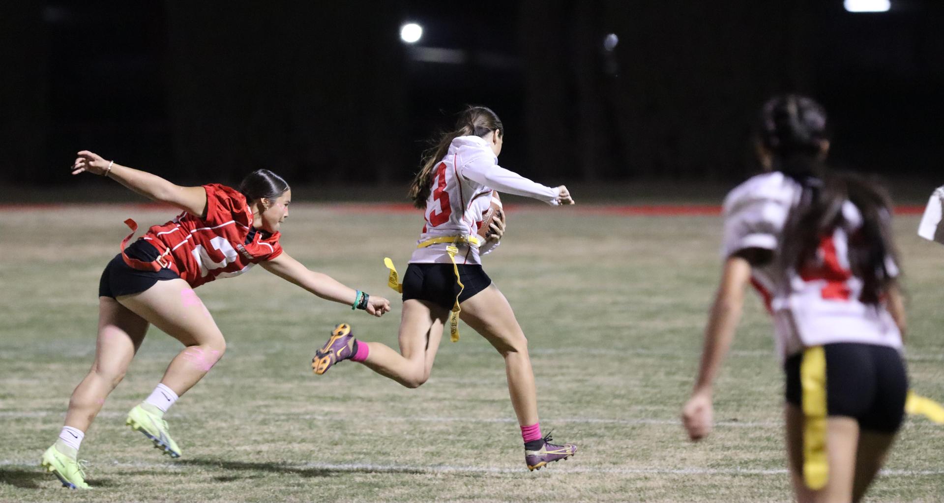 girls playing flag football