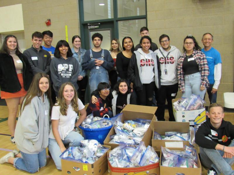 Teen Summit students donate to Shepherd's Pantry