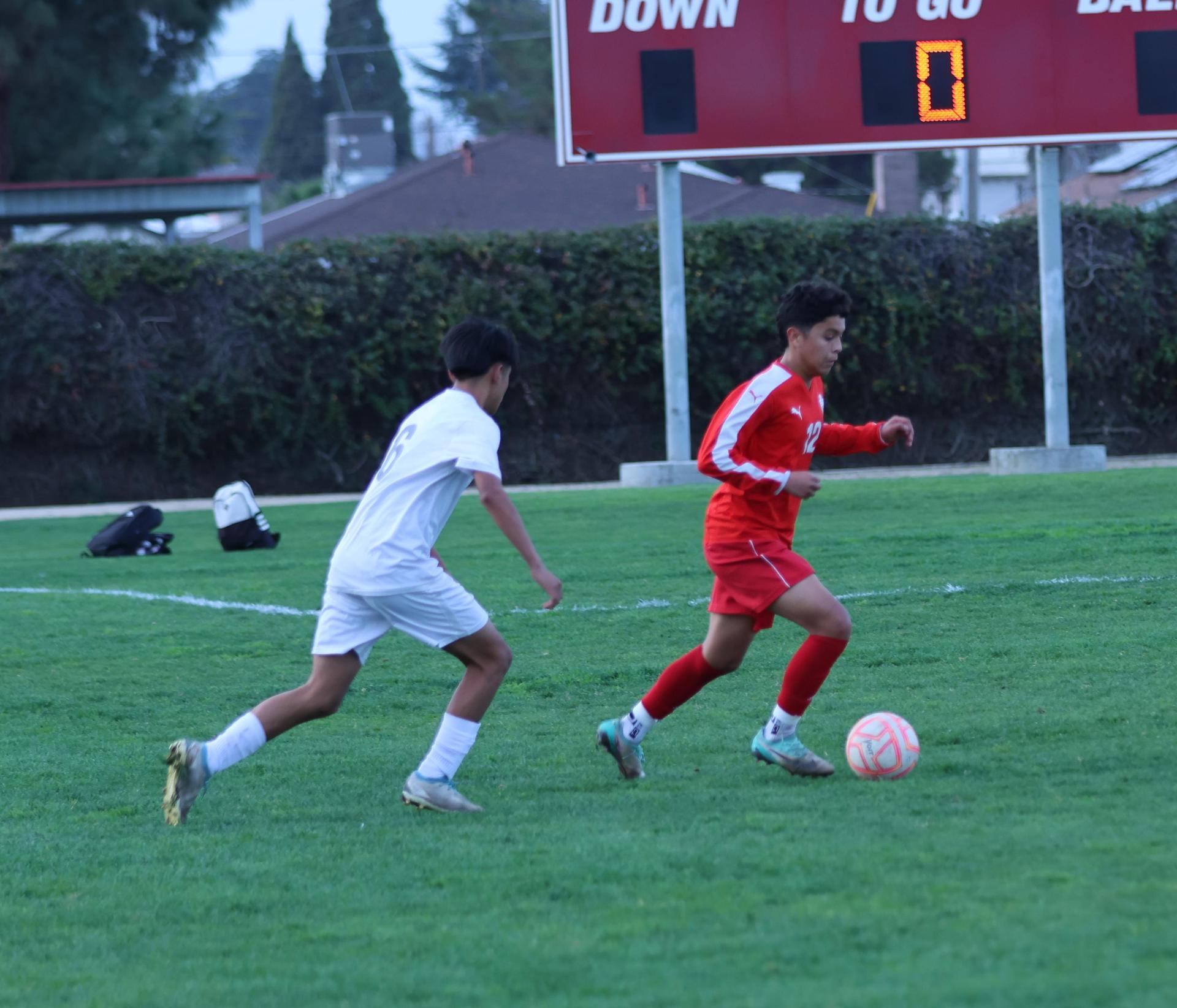junior varsity boys playing soccer against washington union