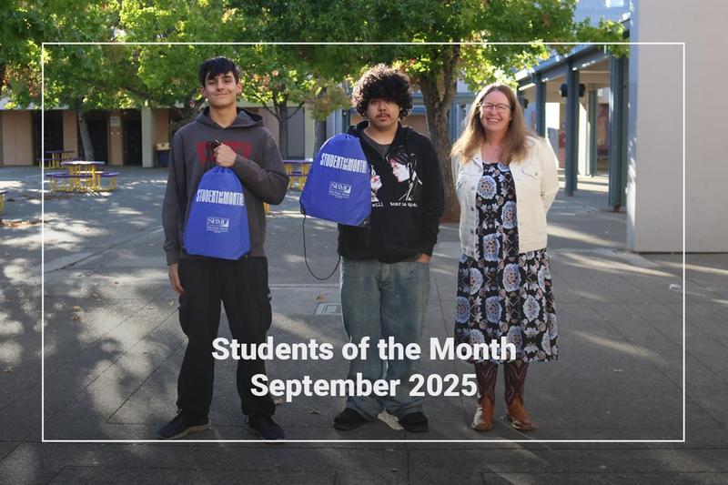 students of the month pose with teacher
