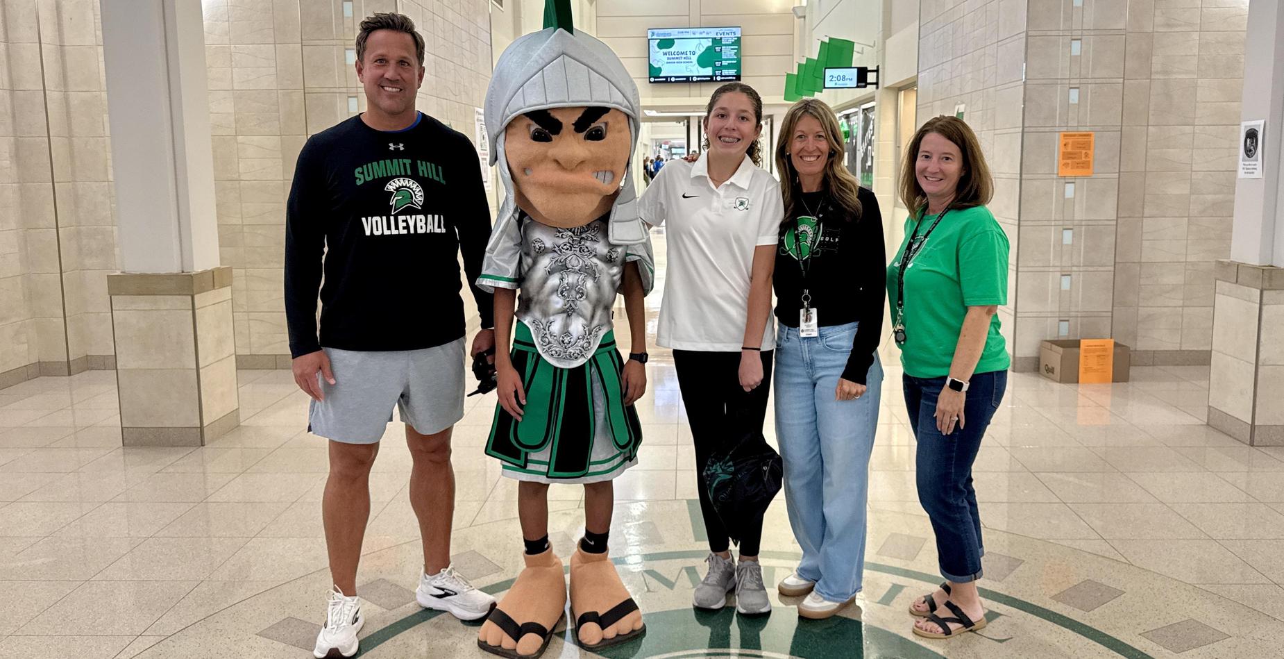 Golf state qualifier with coaches and Sparty