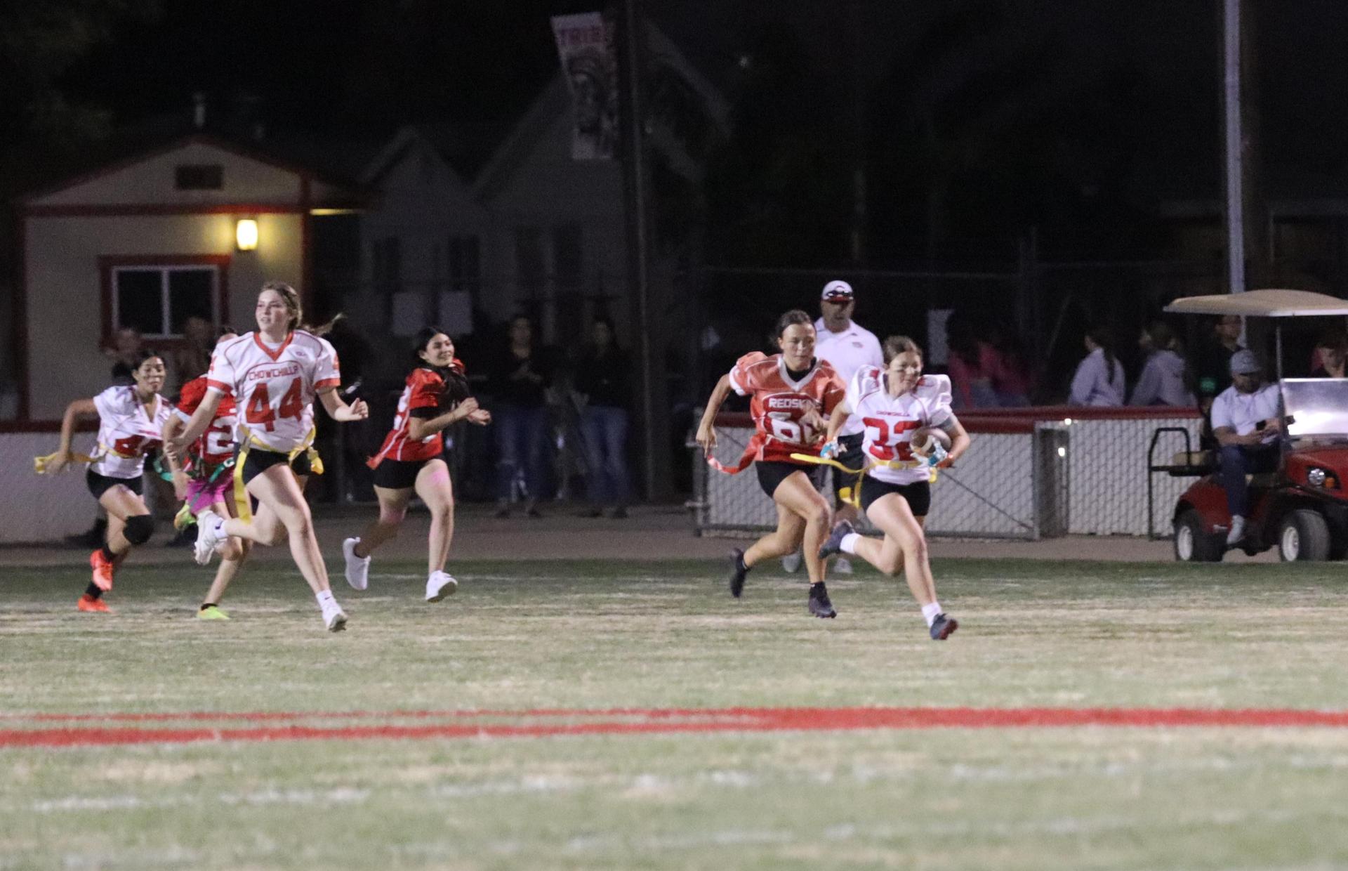 girls playing flag football