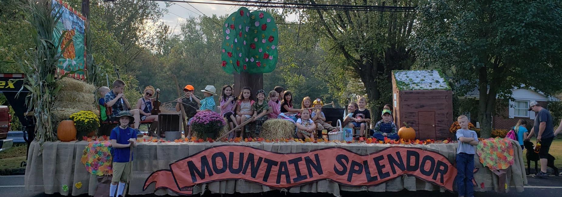 Students on float wait for parade to begin.