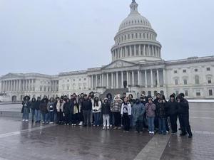 Tenor and Veritas students pose as a group in front of the capitol
