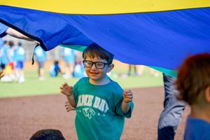 Special Education Student Smiling at Game Day