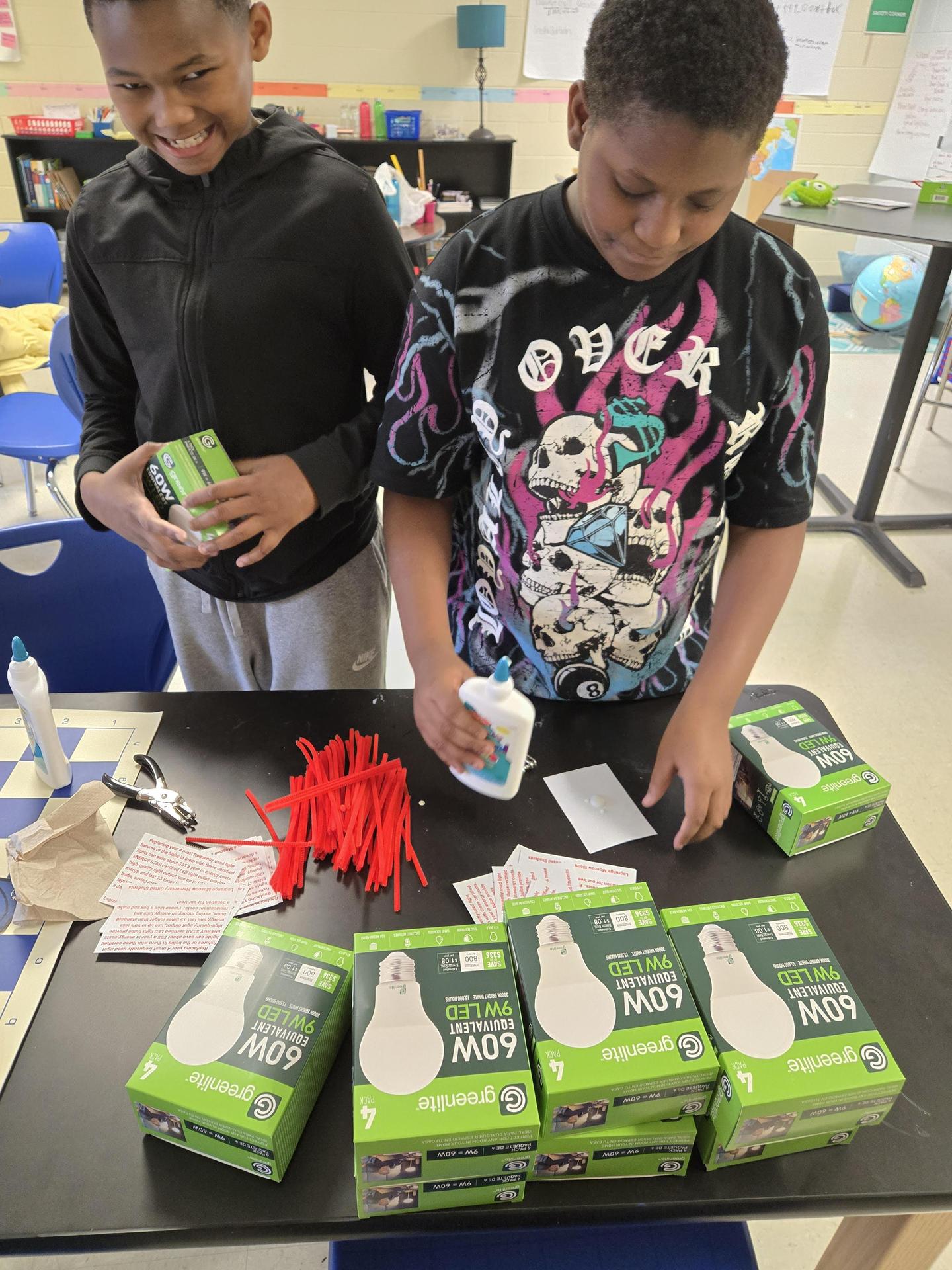 uplift students using lightbulbs as gifts