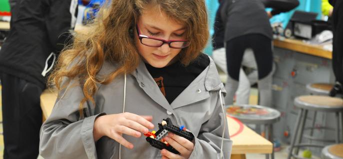student building lego object