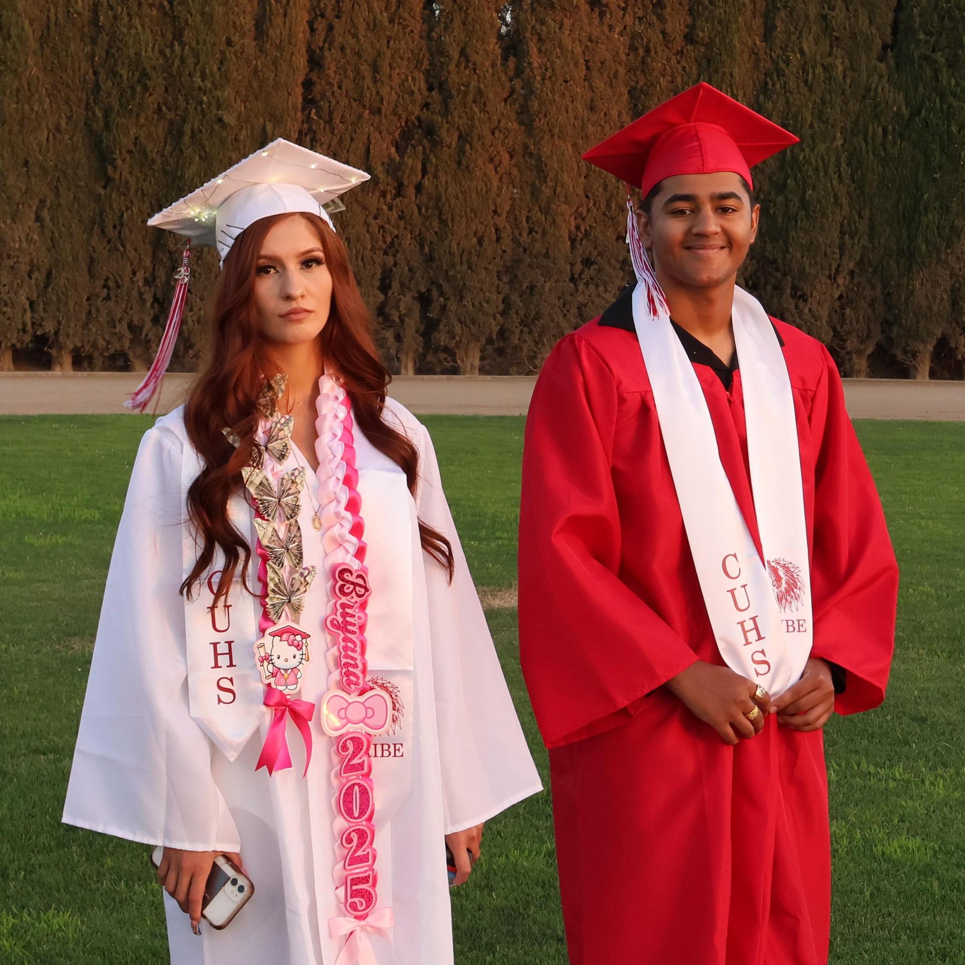seniors posing together before walking in to graduation