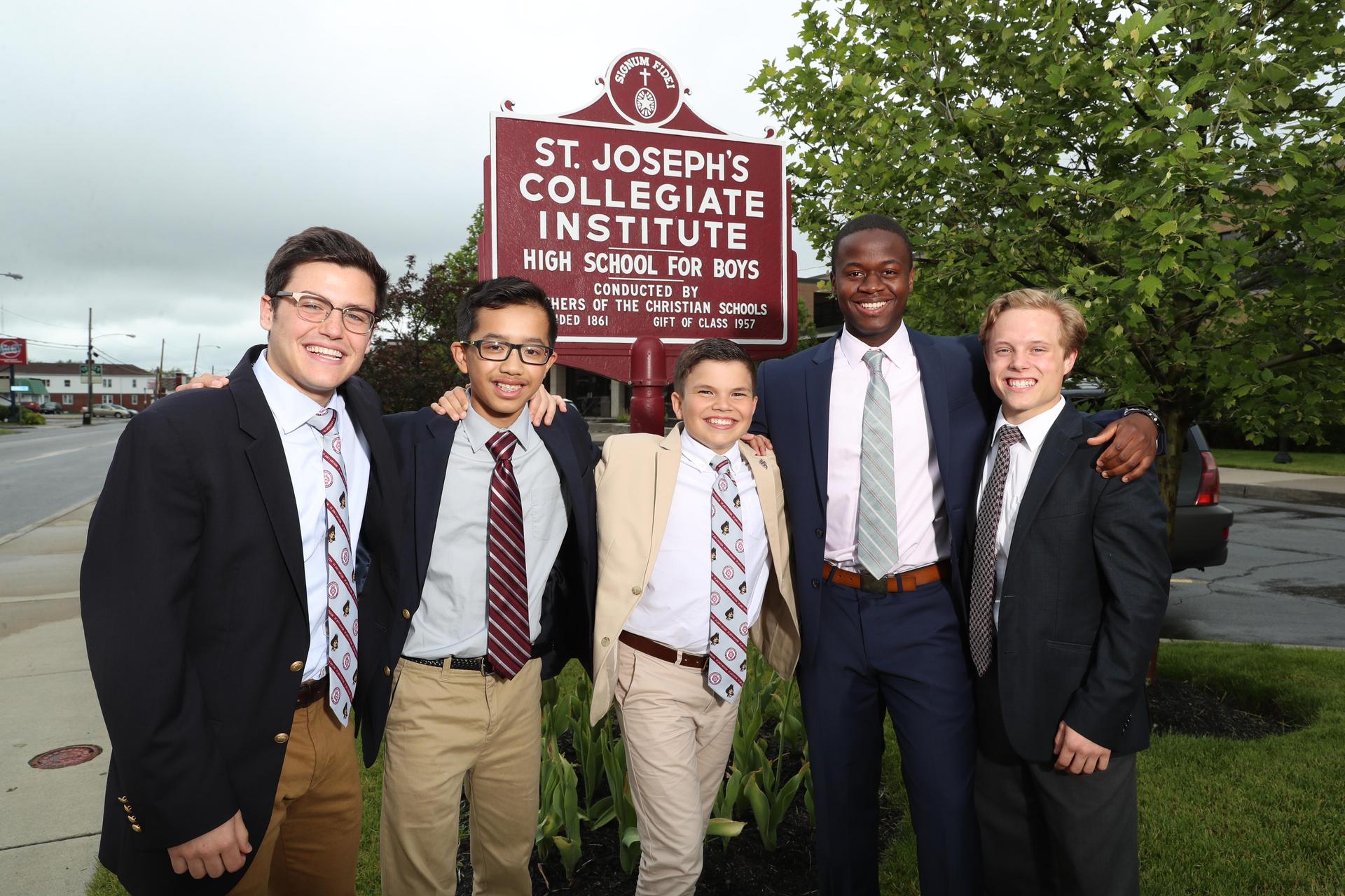 students at sign