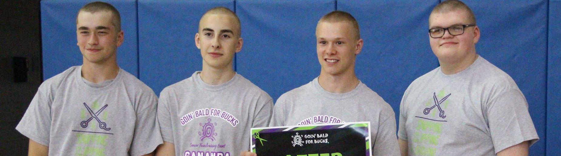 four students after bald for bucks pic