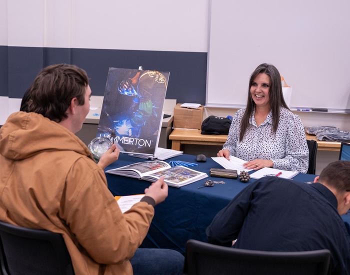 teacher instructing student